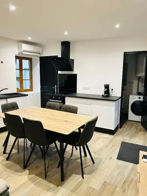 Cuisine ou kitchenette dans l'établissement Petit Confort en Bresse