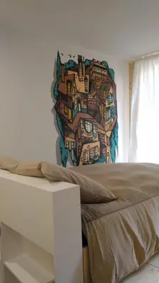Un ou plusieurs lits dans un hébergement de l'établissement Lons appartement T1 centre ville