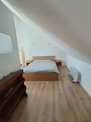 Un ou plusieurs lits dans un hébergement de l'établissement La petite maison