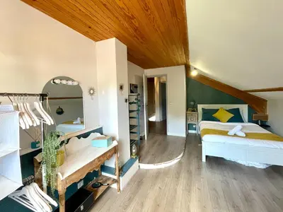 Un ou plusieurs lits dans un hébergement de l'établissement La Casa Del Papa - Maison spacieuse avec jardin