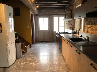 Cuisine ou kitchenette dans l'établissement Maison Millot
