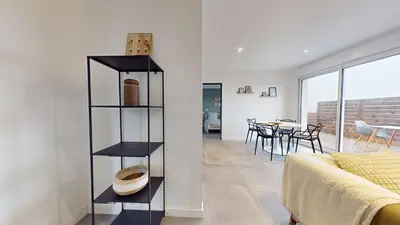 Coin salon dans l'établissement Appartement Premium avec Terrasse - Parking privatif Gratuit - Fibre Wi-Fi - À 2 min Centre-Ville Dole