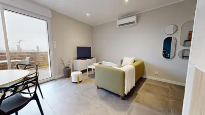 Coin salon dans l'établissement Appartement Premium avec Terrasse - Parking privatif Gratuit - Fibre Wi-Fi - À 2 min Centre-Ville Dole