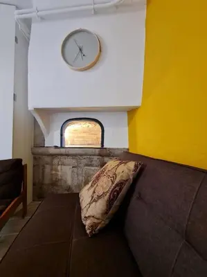 Coin salon dans l'établissement Gite du bibicherat