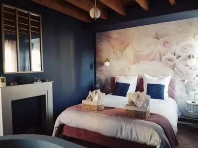 Un ou plusieurs lits dans un hébergement de l'établissement Rose & Blue Spa proche Chalon S/Saône et Beaune