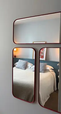 Un ou plusieurs lits dans un hébergement de l'établissement Le Téméraire Hôtel