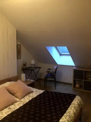 Un ou plusieurs lits dans un hébergement de l'établissement La maison de Jeanne