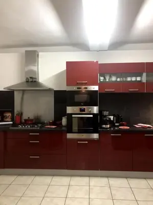 Cuisine ou kitchenette dans l'établissement La maison de Jeanne