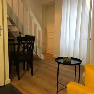 Coin salon dans l'établissement Joli duplex