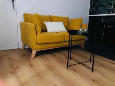 Coin salon dans l'établissement Joli duplex