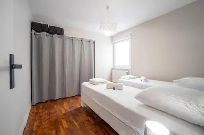 Un ou plusieurs lits dans un hébergement de l'établissement Appartement centre-ville 6 personnes