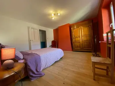 Un ou plusieurs lits dans un hébergement de l'établissement Au Lavoir
