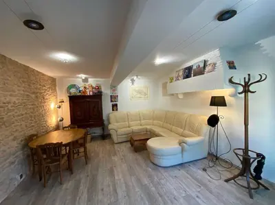 Coin salon dans l'établissement Au Lavoir