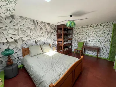 Un ou plusieurs lits dans un hébergement de l'établissement La Maison d'Andrée - chambres et table d'hôtes