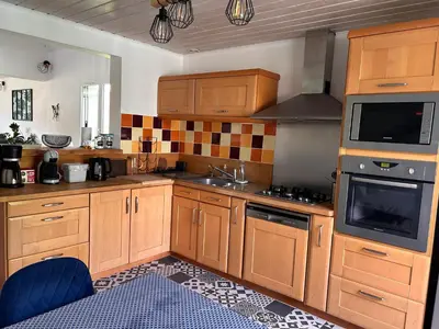 Cuisine ou kitchenette dans l'établissement La maison de Lilylou
