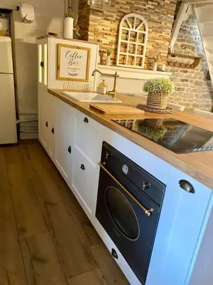 Cuisine ou kitchenette dans l'établissement L'écrin, charmant cottage aux portes de la cité médiévale de Semur-en-Auxois