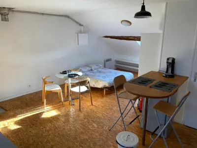 Un ou plusieurs lits dans un hébergement de l'établissement Studio Orgelet-Lac de Vouglans