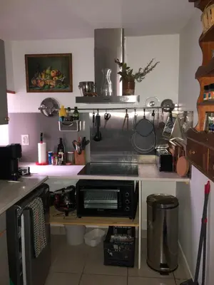 Cuisine ou kitchenette dans l'établissement La Maison Rose