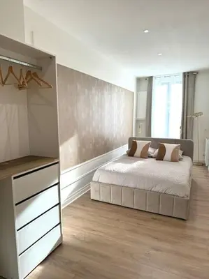 Un ou plusieurs lits dans un hébergement de l'établissement Appartement avec magnifique vue sur la Saône et son balcon