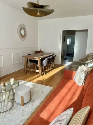 Coin salon dans l'établissement Appartement avec magnifique vue sur la Saône et son balcon