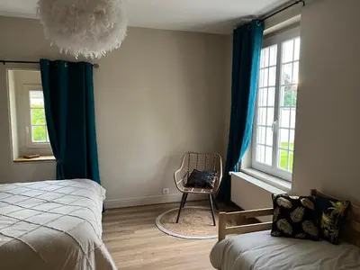 Un ou plusieurs lits dans un hébergement de l'établissement Les chambres de Mila
