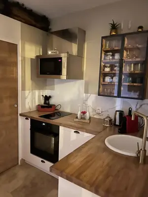 Cuisine ou kitchenette dans l'établissement détente centre historique de MÂCON avec spa et ciné