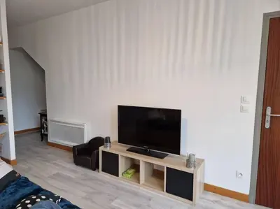 Télévision ou salle de divertissement dans l'établissement Chez Aurélie et Bruno