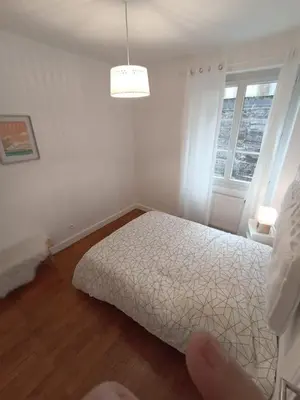 Un ou plusieurs lits dans un hébergement de l'établissement Le Blue IVY Hyper centre 2 chambres Tout équipe
