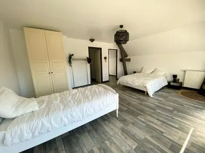 Un ou plusieurs lits dans un hébergement de l'établissement Villa avec piscine d'intérieur “ Losalia “