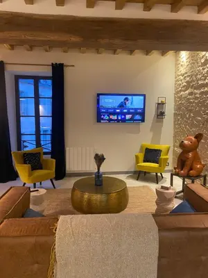 Télévision ou salle de divertissement dans l'établissement Maison Authentique « Bleue Nuits »