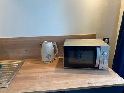 Cuisine ou kitchenette dans l'établissement Maison Authentique « Bleue Nuits »