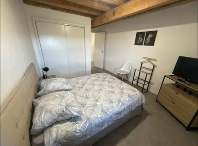 Un ou plusieurs lits dans un hébergement de l'établissement Maison Loft au pied des Vignes