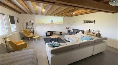 Coin salon dans l'établissement Maison Loft au pied des Vignes