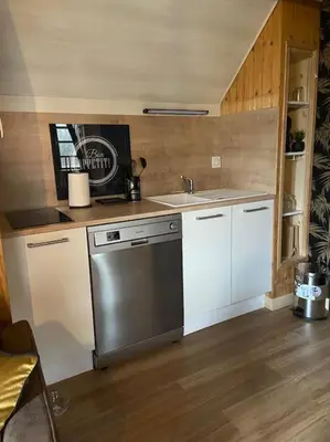 Cuisine ou kitchenette dans l'établissement Le chalet de l’Onde