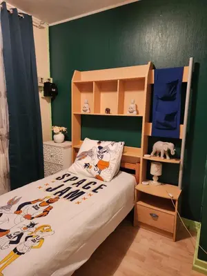 Un ou plusieurs lits dans un hébergement de l'établissement Maison de vacances