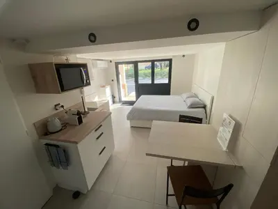 Cuisine ou kitchenette dans l'établissement Studio chez l habitant - CLIM - piscine - EV borne 22kW