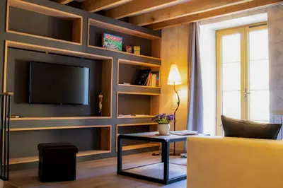 Télévision ou salle de divertissement dans l'établissement Maison familiale de charme à 15 min de Beaune