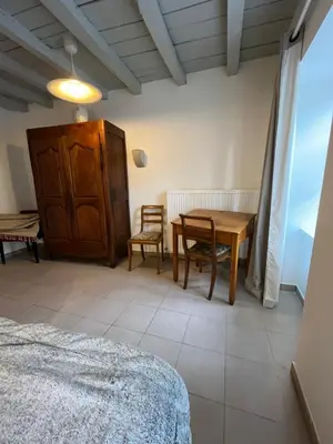 Un ou plusieurs lits dans un hébergement de l'établissement Gite des laitières en bourgogne