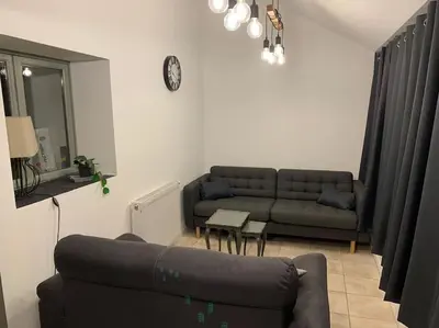 Coin salon dans l'établissement La Bétamotte: Maison entière avec piscine dans le parc du Morvan