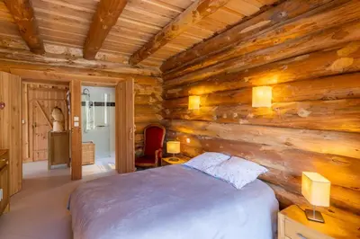 Un ou plusieurs lits dans un hébergement de l'établissement Chalet l'Epicurien - Au calme avec grand jardin