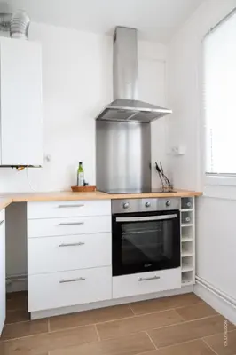 Cuisine ou kitchenette dans l'établissement Le Kuku Beach - Appartement de charme à Digoin