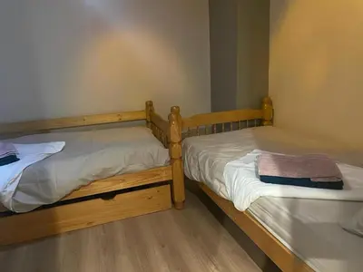 Un ou plusieurs lits dans un hébergement de l'établissement Escapade à Ladoix Serrigny