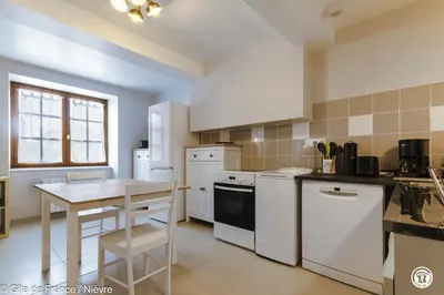 Cuisine ou kitchenette dans l'établissement Le gîte de la poste