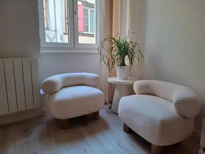 Coin salon dans l'établissement Studio centre Macon place aux herbes