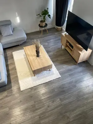 Télévision ou salle de divertissement dans l'établissement L'appart Saint-Laurent