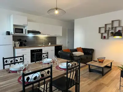 Cuisine ou kitchenette dans l'établissement Appartement Cosy