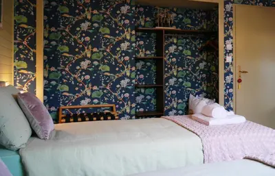 Un ou plusieurs lits dans un hébergement de l'établissement Chambres d'Hôtes La mésange à tête Bleue