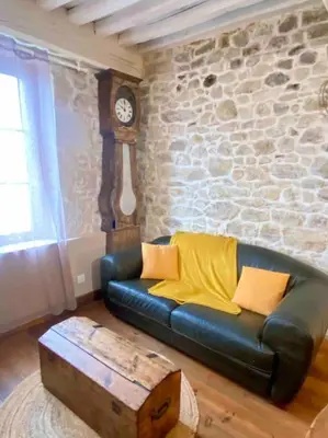 Coin salon dans l'établissement Le nid du coq d'or location appartement