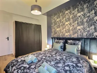 Un ou plusieurs lits dans un hébergement de l'établissement ''Douceur'' de Miss.K Conciergerie