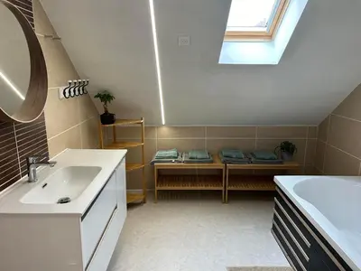Un ou plusieurs lits dans un hébergement de l'établissement La maison du chêne